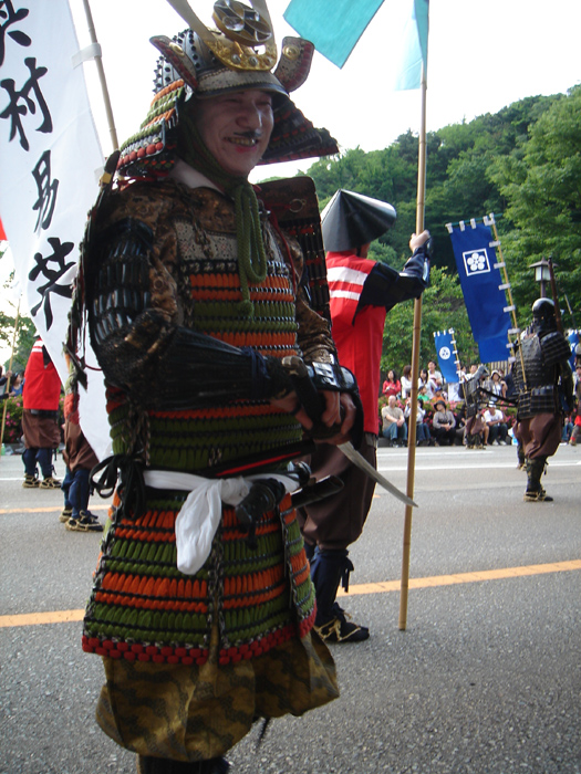 A man dressed in samurai armor during the parade at the Kanazawa One Million Stone’s Festival