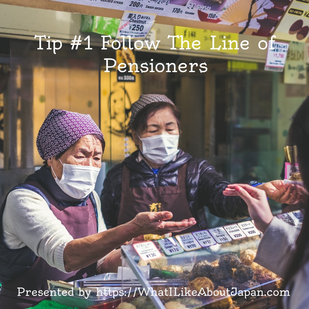 Japanese Culture, Follow the Line of Pensioners, Two older Japanese ladies selling something at an outdoor market.