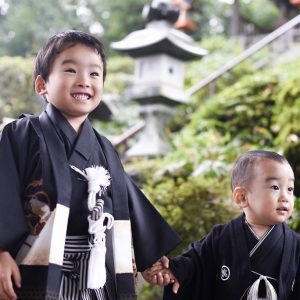 Japanese Culture, November in Japan, Two little boys dressed up traditional Japanese kimonos or having their picture taken during ShichiGoSan.