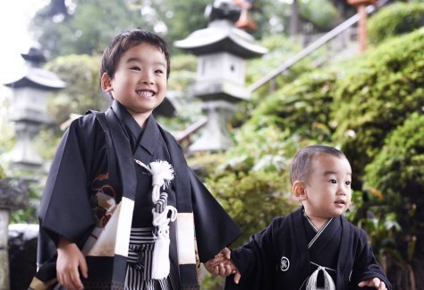 Japanese Culture, November in Japan, Two little boys dressed up traditional Japanese kimonos or having their picture taken during ShichiGoSan.