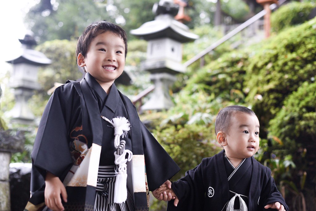 Japanese Culture, November in Japan, Two little boys dressed up traditional Japanese kimonos or having their picture taken during ShichiGoSan.