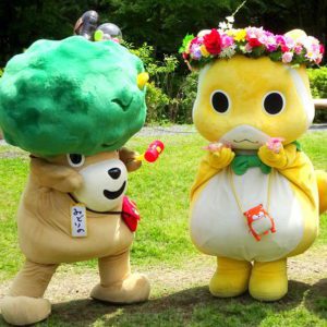 Green Day, Greenery Day, Japanese Culture, Japan in May, May in Japan, Golden Week, Two super cute O-bake mascots in a green lawn representing care for the parks and gardens in Japan.