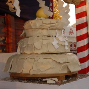 A huge four layered cake of mochi at a shrine that is so old and brittle that the outside mochi is flaking off!