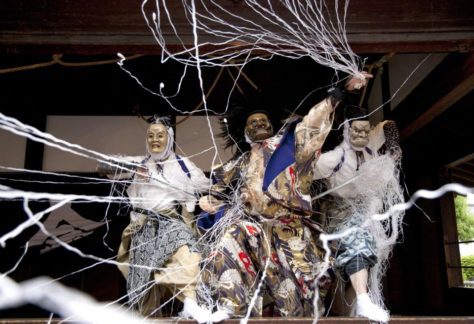 Actors performing Buddhist moral plays called Mibu Kyōgen near Kyoto.