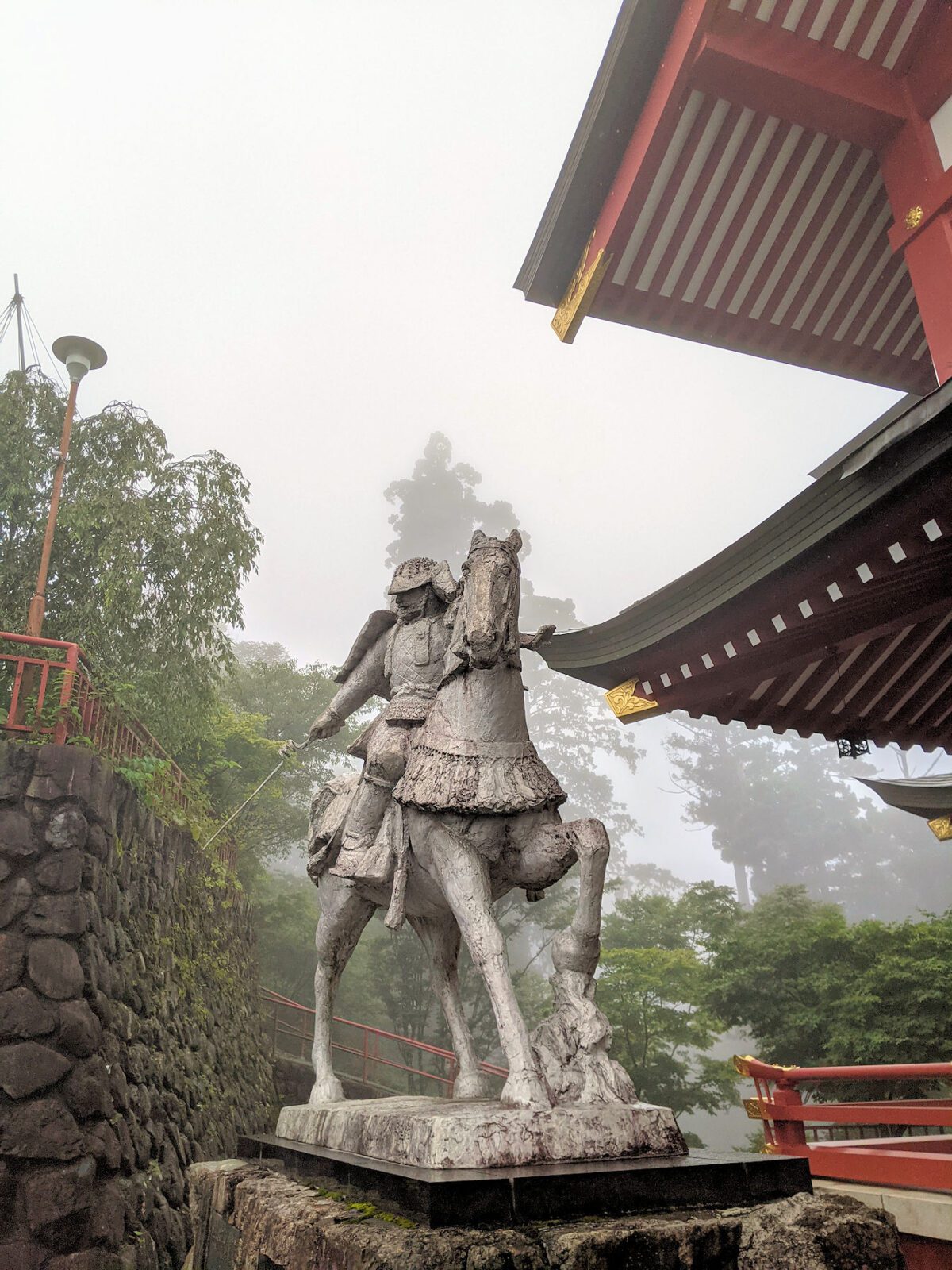 Japanaese Culture, Exploring Japan, MounT Miake,A statue of a mount samurai in full armour on tip of Mount Mitake.